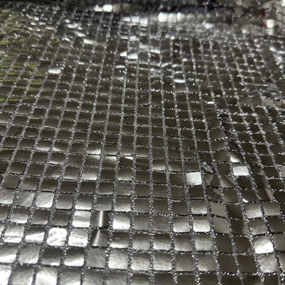 Silver and Black Sequence Fabric.  3 1/3 yards.